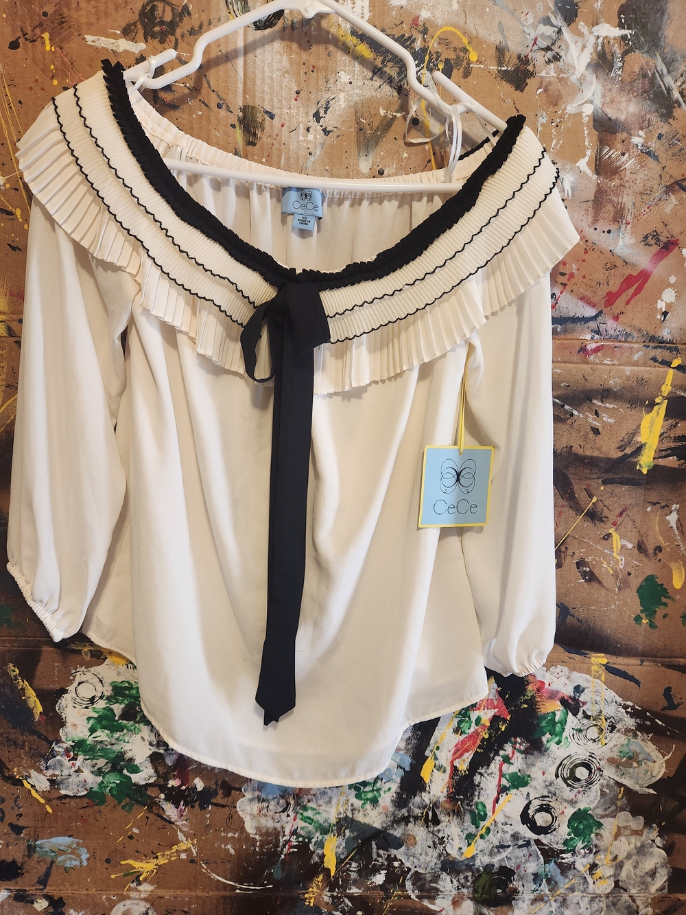 CeCe Cream Off-Shoulder Ruffle Blouse with Black Trim